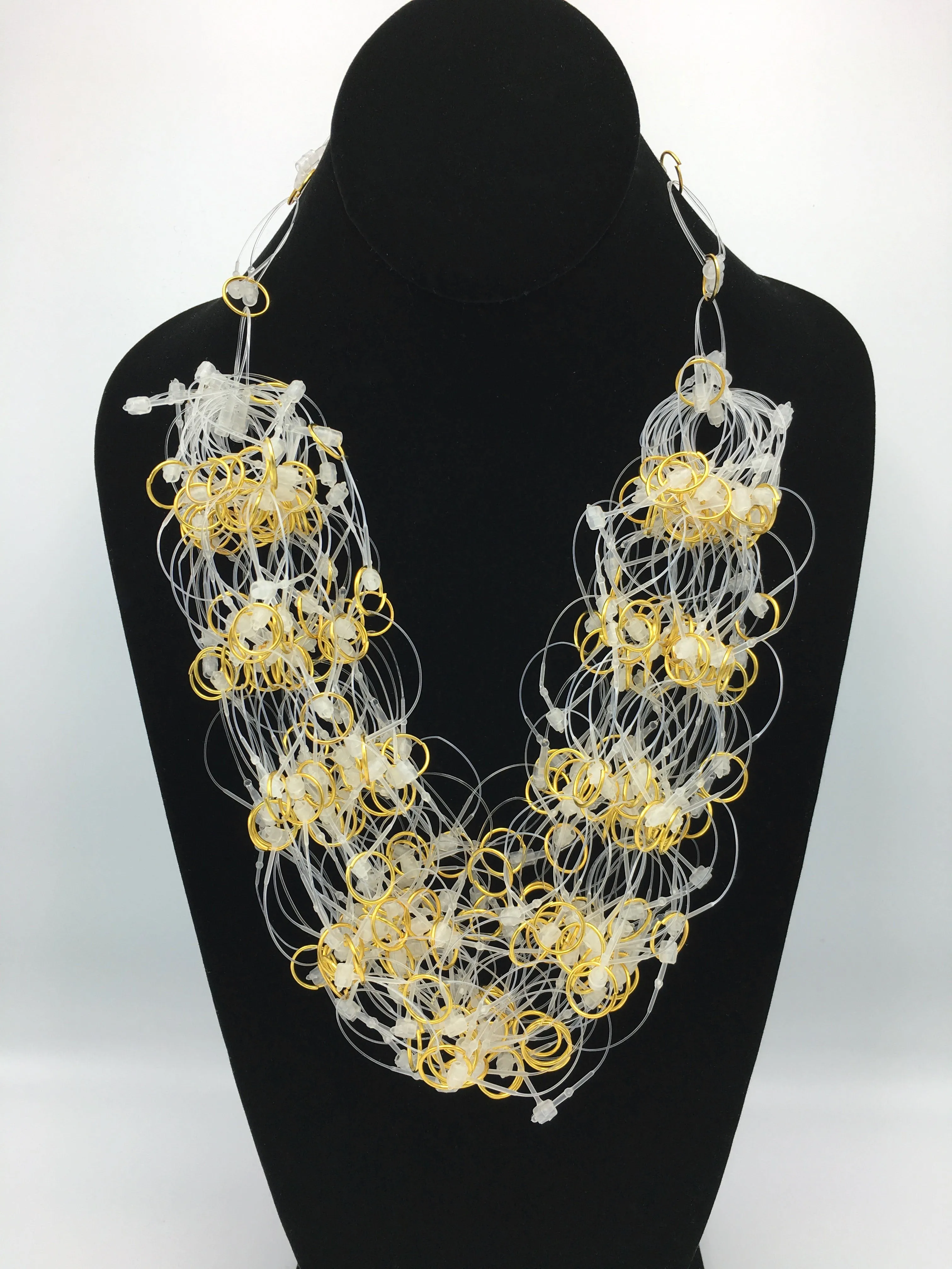 Web of Ties and Gold Rings Necklace